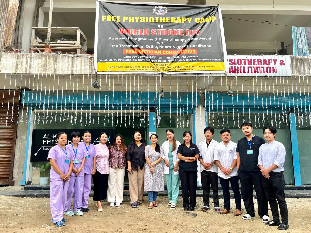 Group of participants and healthcare professionals at AL-KO Physiotherapy Center’s World Stroke Day Health Camp receiving free consultations and wellness guidance.